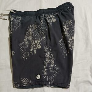 VUORI Men's Medium swim trunks Grey with a tropical print full support lining